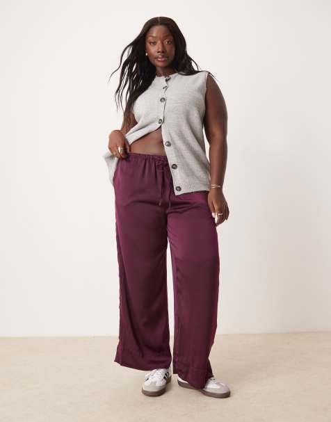 ASOS DESIGN Curve – Plommonfärgade byxor i dra på-modell av satin - view 1