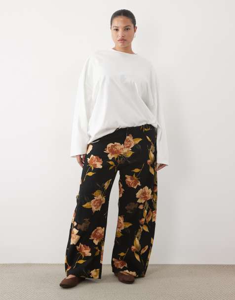 ASOS DESIGN Curve printed barrel leg pant in black floral - view 1