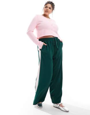 Curve pull on pants with contrast panel in forest green