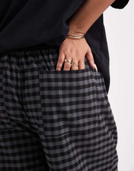 ASOS DESIGN Curve pull on tie waist barrel leg pants in black & gray gingham