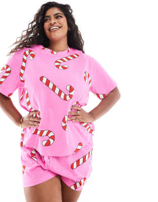 ASOS DESIGN Curve - Pyjama in Rosa mit Oversize-T-Shirt und Shorts mit Zuckerstangen-Muster