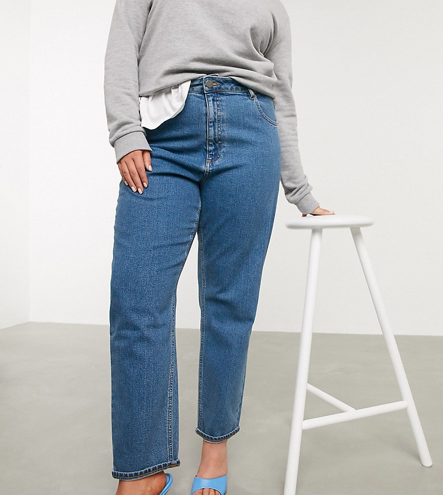 Plus-size jeans by ASOS DESIGN Part of our responsible edit High-rise waist Concealed fly Functional pockets Sits on the ankle Slim, tapered fit Cut closely around the thigh with a narrow shape through the leg