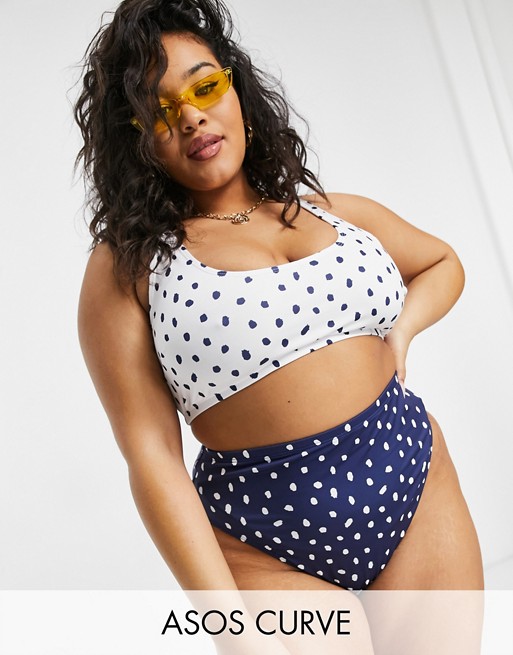 ASOS DESIGN Curve mix and match crop bikini top in navy polka dot spot