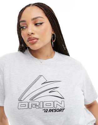 ASOS DESIGN Curve regular fit t-shirt with sports graphic logo in ice ...