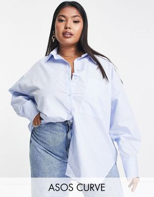 ASOS DESIGN Curve relaxed dad shirt with dipped hem in chambray blue - ASOS Price Checker