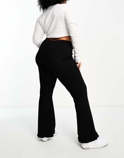 ASOS DESIGN Curve rib flare pants with lettuce hem in black, 2 of 4