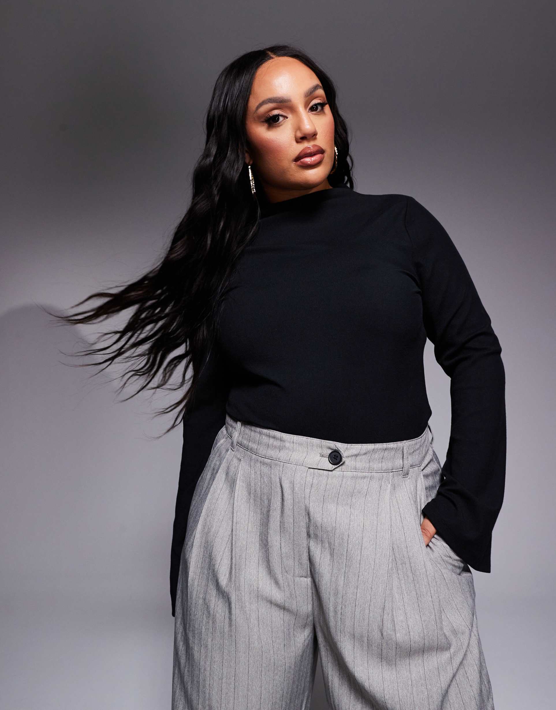 asos design curve ribbed bodysuit with flared sleeves in black