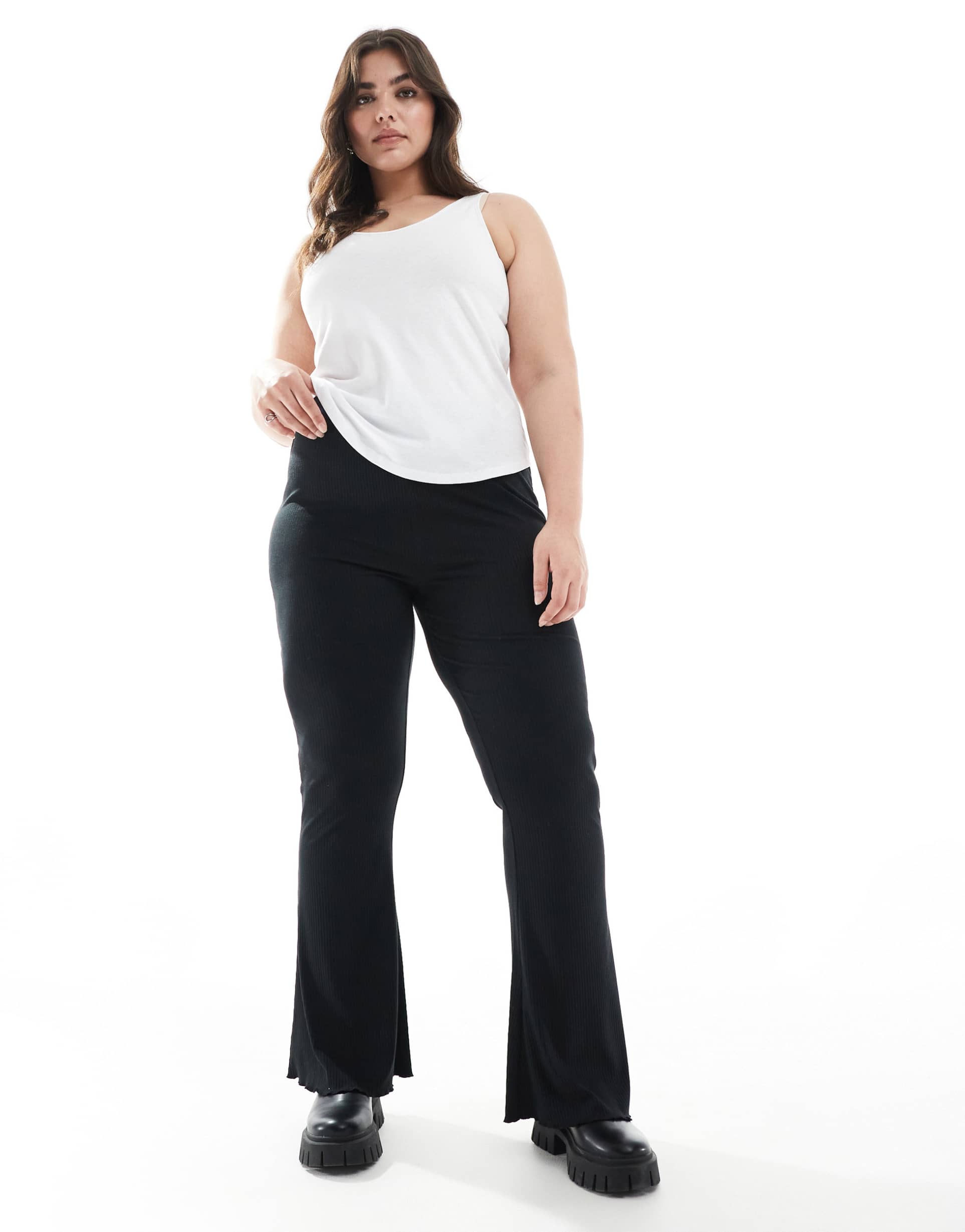 asos design curve ribbed flare pants with lettuce hem in black