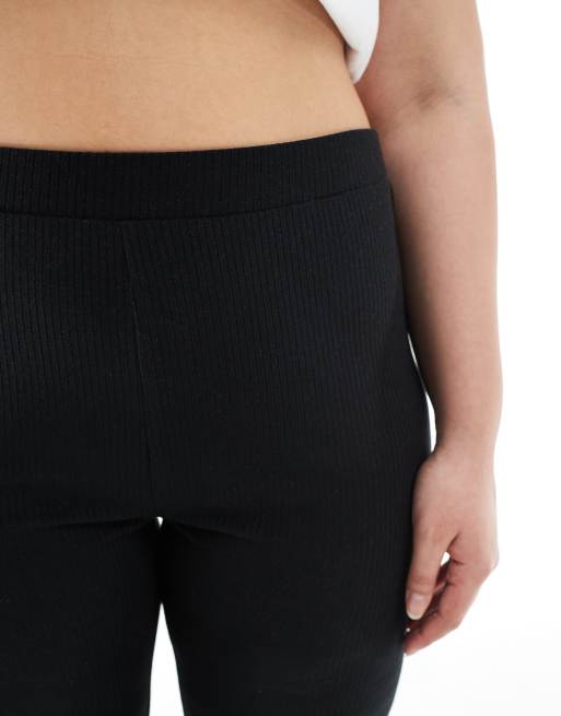 ASOS DESIGN Curve ribbed flare pants with lettuce hem in black, 4 of 5