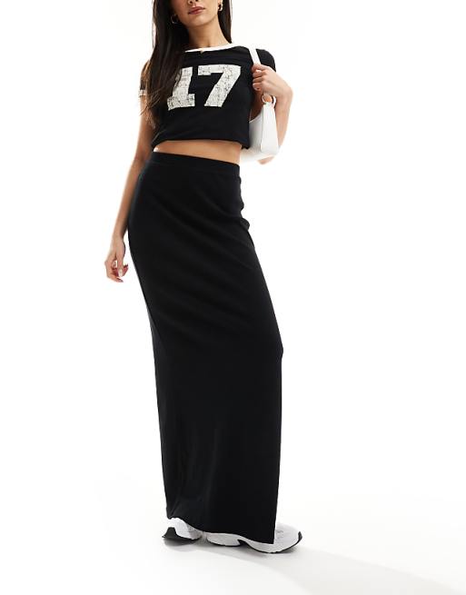 ASOS DESIGN Curve ribbed maxi skirt with side slit in black ASOS DESIGN Curve ribbed maxi skirt with side slit in black