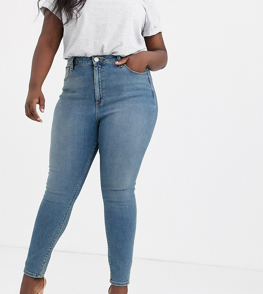 ASOS DESIGN Curve - Ridley - Skinny jeans met hoge taille in middenblauw met stonewash