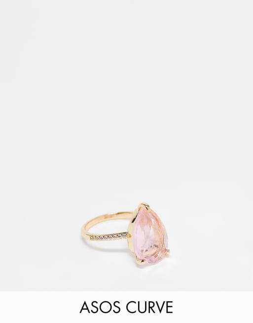 ASOS DESIGN Curve ring with teardrop pink crystal in gold tone