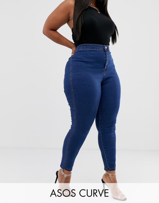 ASOS DESIGN Curve Rivington high waisted denim jeggings in flat mid wash  blue