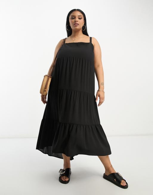 ASOS DESIGN Curve - Robe longue à volants étagés et ourlet asymétrique - Noir
