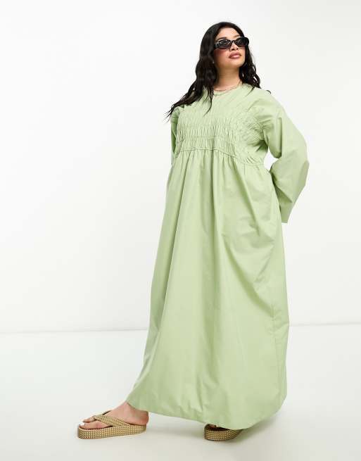 ASOS DESIGN Curve - Robe longue épurée et froncée à manches chauve-souris - Vert
