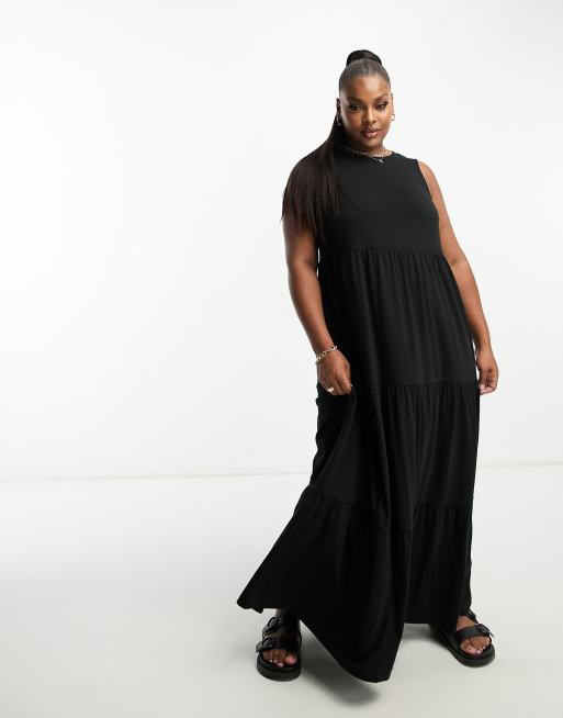 ASOS DESIGN Curve - Robe longue sans manches à volants étagés - Noir