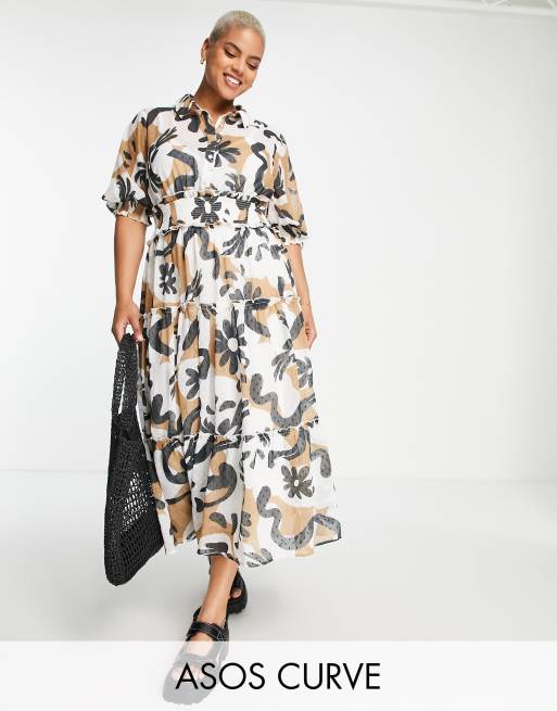 ASOS DESIGN Curve - Robe mi-longue à imprimé fleuri abstrait et col avec volants étagés et taille froncée 