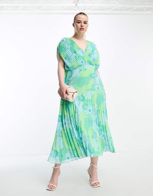 ASOS DESIGN Curve - Robe mi-longue plissée à fleurs avec col en V et ourlet étagé - Bleu