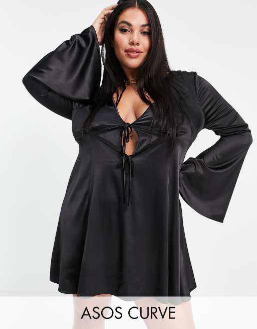 ASOS DESIGN Curve - Robe patineuse courte ajustée puis évasée avec lien noué sur le devant - Noir