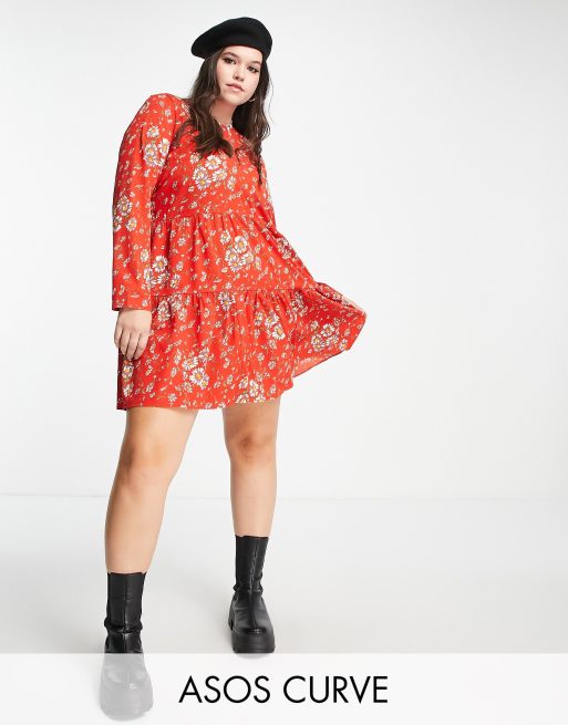 ASOS DESIGN Curve – Rödblommig, panelsydd miniklänning med smock och långa ärmar