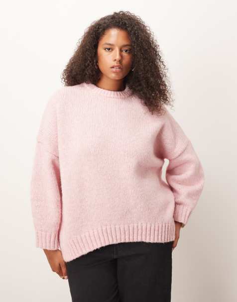 ASOS DESIGN Curve oversized crew neck jumper with curved hem in pink