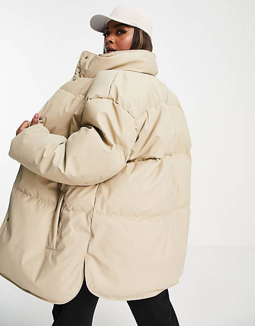 Malignant distress lightweight ASOS DESIGN Curve rubberized oversized puffer jacket in camel | ASOS