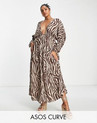 ASOS DESIGN Curve ruched long sleeve plunge beach maxi dress in animal print