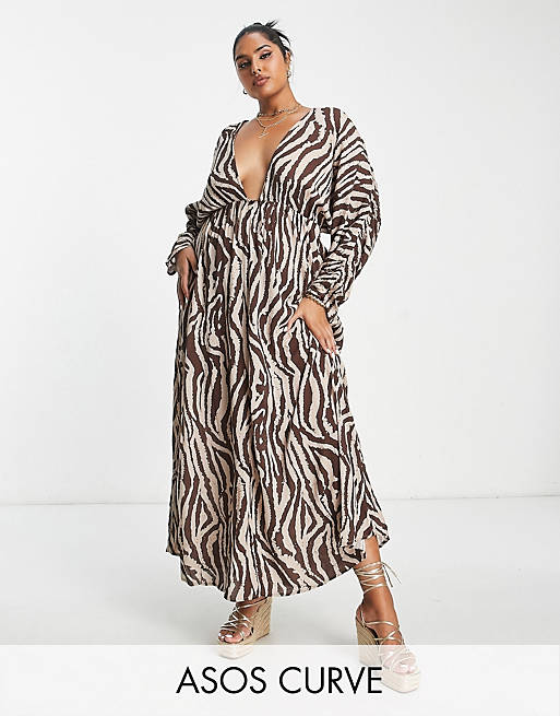 ASOS DESIGN Curve ruched long sleeve plunge beach maxi dress in animal print  | ASOS