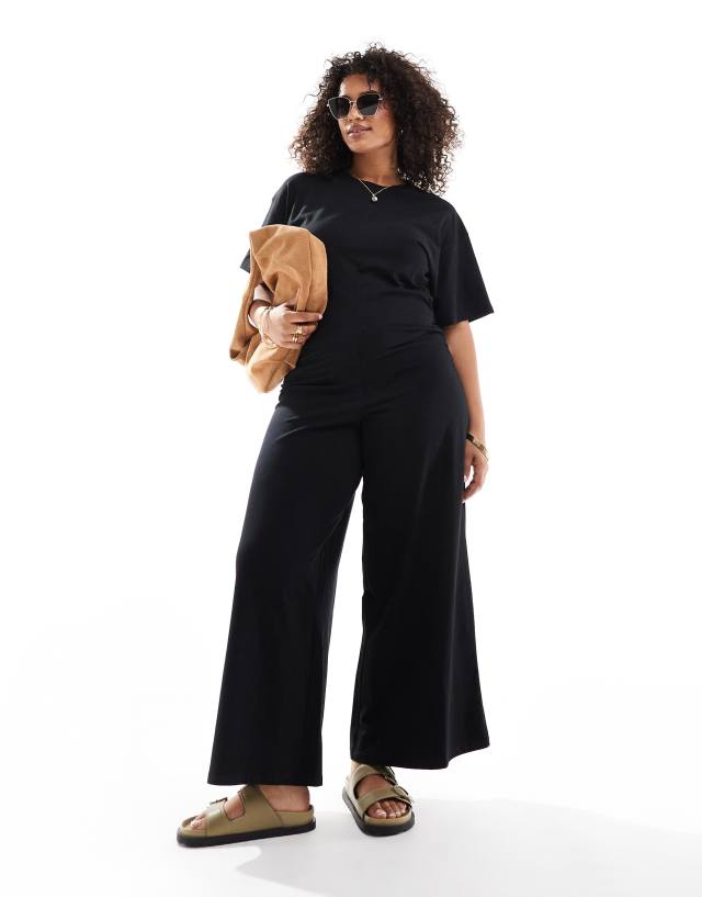 ASOS Curve - ASOS DESIGN Curve ruched side jumpsuit with wide leg in black