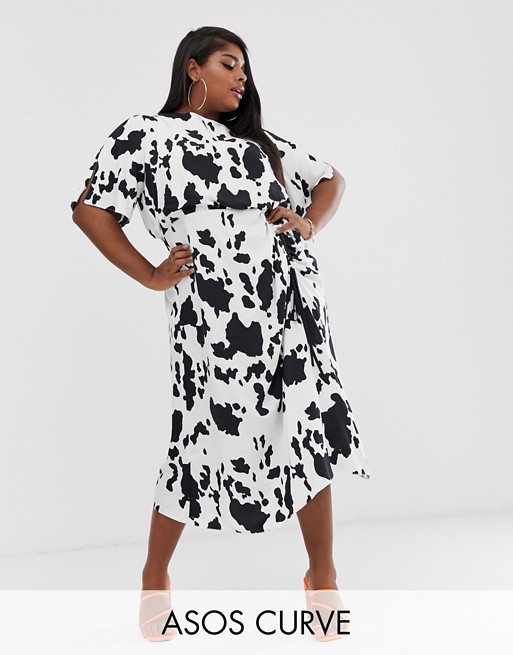 ASOS DESIGN Curve ruched skirt midi dress in cow print