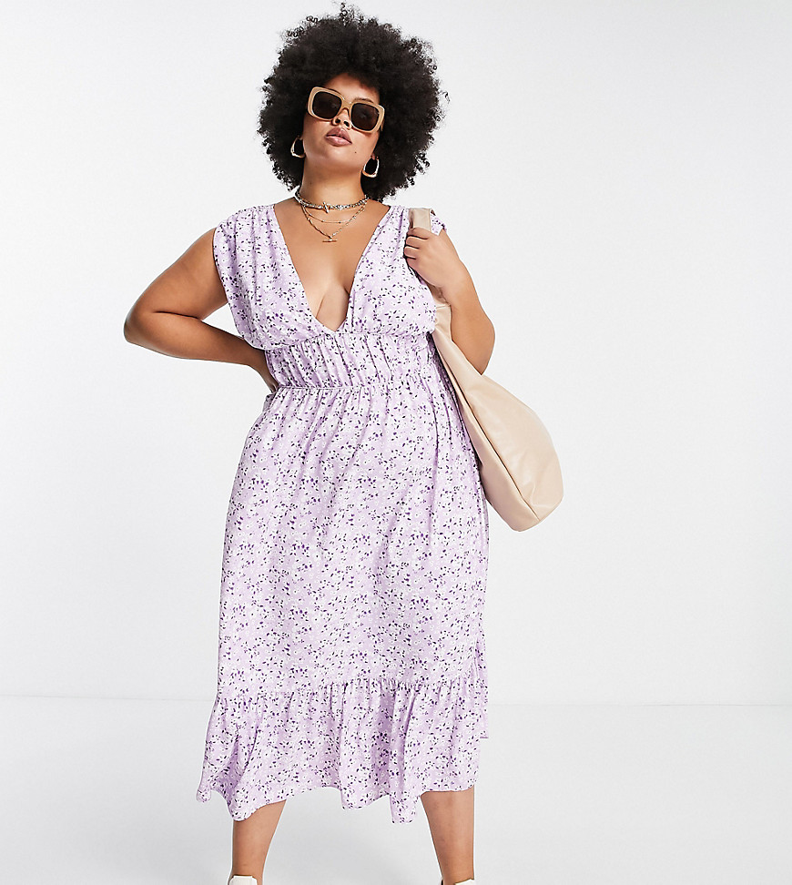 Plus-size dress by ASOS DESIGN Great lengths All-over floral print Plunge neck Sleeveless style Frill skirt Regular fit