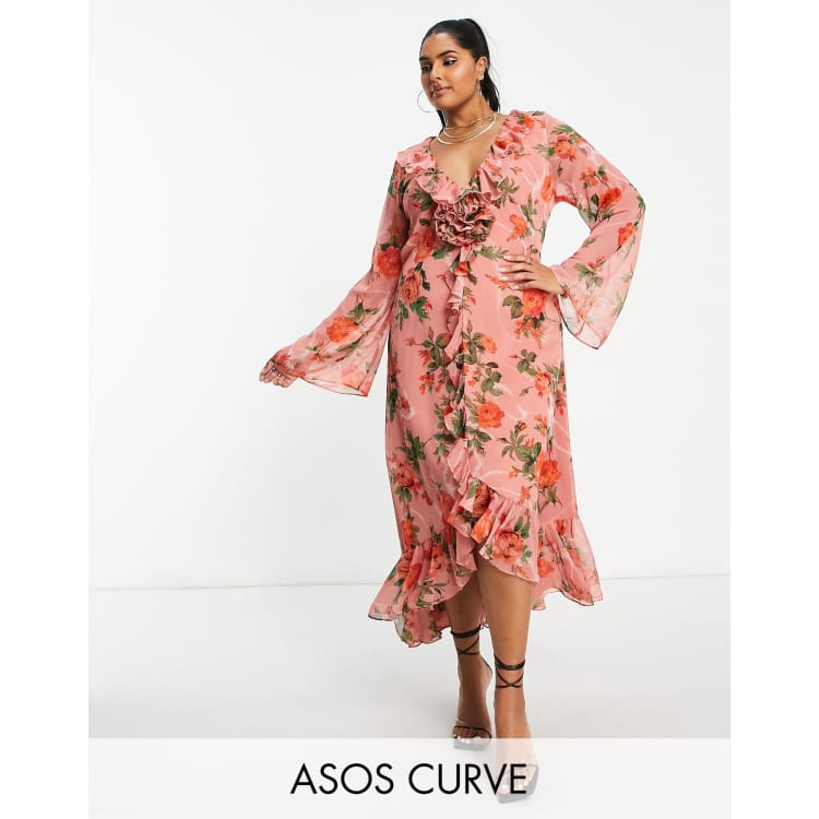 ASOS DESIGN Curve ruffle detail plunge midi dress with corsage in crinkle in pink floral print