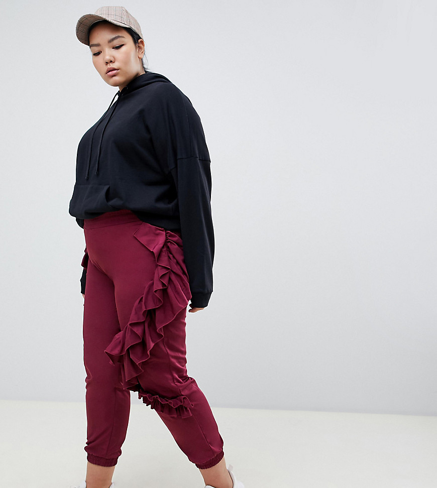 Plus-size trousers by ASOS DESIGN For when comfort is key High-rise, stretch waist Frill trims Ruffle things up Fitted cuffs Skinny fit - cut closely from hips to hem