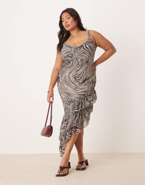 ASOS DESIGN Curve ruffle scoop neck asymmetric frill hem midi dress in animal print - view 1