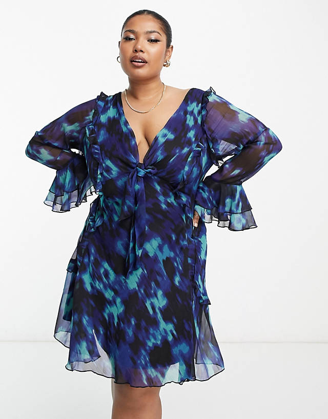 ASOS DESIGN Curve ruffle tie front plunge mini dress with ruffle sleeves in black and blue abstract print ZN11998
