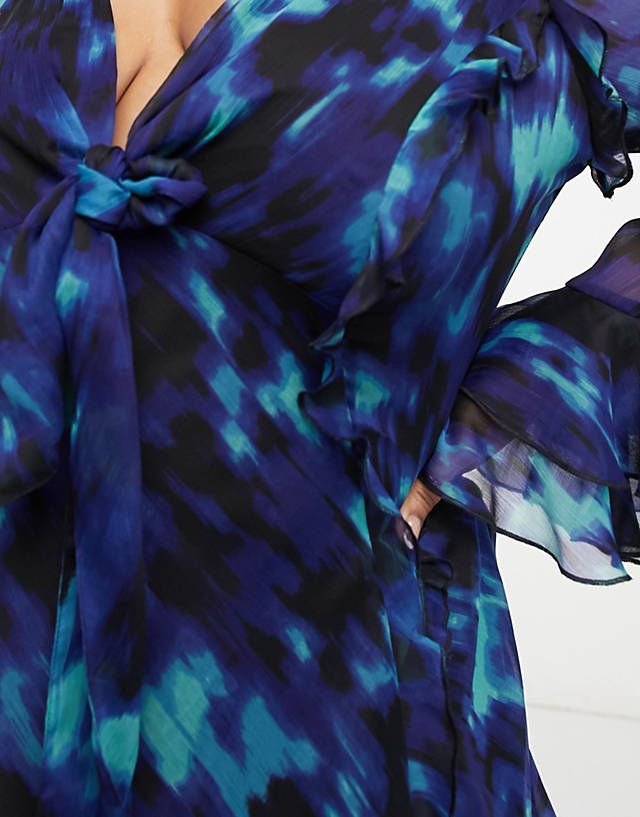 ASOS DESIGN Curve ruffle tie front plunge mini dress with ruffle sleeves in black and blue abstract print ZN11998