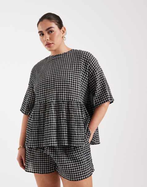 ASOS DESIGN Curve – Rutig peplum-topp i oversize med korta ärmar - view 1