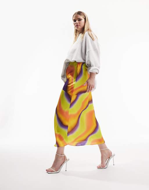 ASOS DESIGN Curve satin bias midi skirt in bright tie dye print