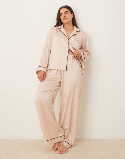 ASOS DESIGN Curve satin shirt & trouser pyjama set in champagne pink - view 1