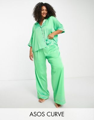 ASOS DESIGN Curve satin shirt & trouser pyjama set with contrast piping in green