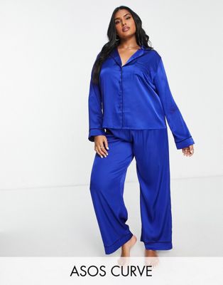ASOS DESIGN Curve satin shirt & trouser pyjama set with contrast piping in rich blue