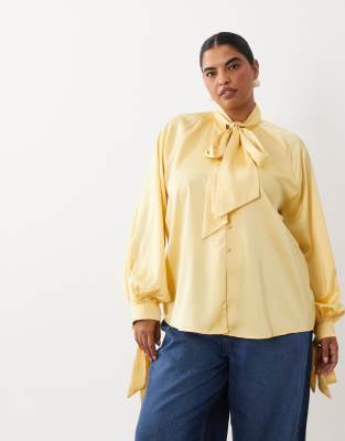 Asos Curve Asos Design Curve Satin Tie Cuff Tie Neck Button Down Blouse In Yellow