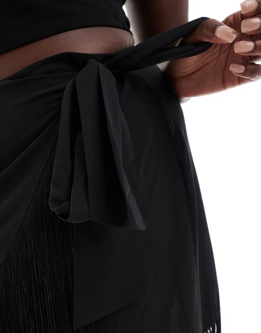 ASOS DESIGN Curve satin wrap fringe maxi skirt in black