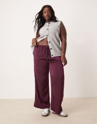 ASOS DESIGN Curve - Schlupfhose aus Satin in Pflaume-Lila