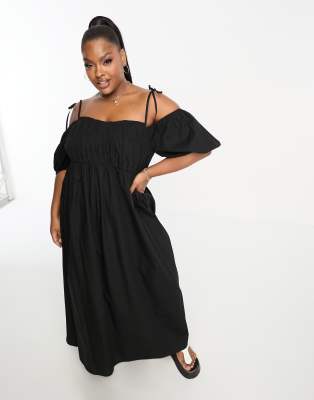 ASOS DESIGN Curve - Schulterfreies Baumwoll-Maxikleid mit geraffter Brustpartie in Schwarz-Black