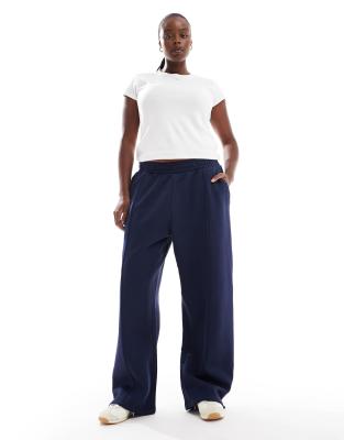 ASOS DESIGN Curve - Schwere Jogginghose in Marineblau mit geradem Bein und Biesen