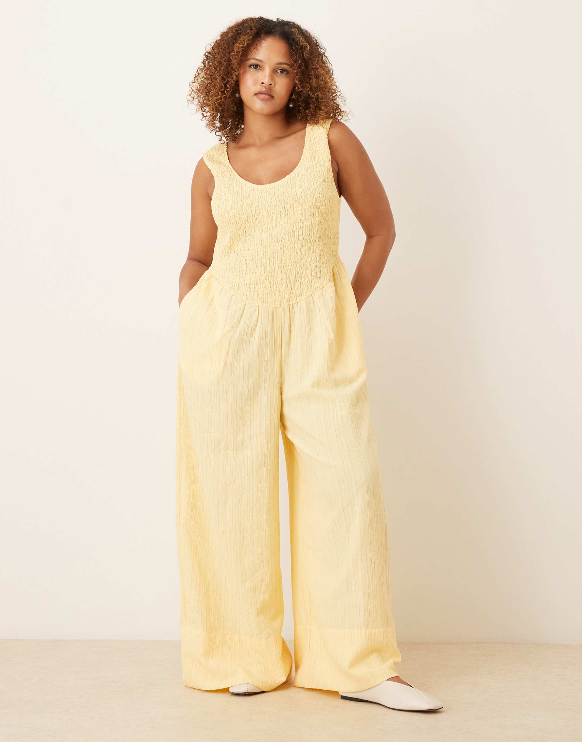 asos design curve scoop neck crinkle jumpsuit in buttermilk