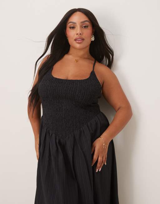 ASOS DESIGN Curve scoop neck crinkle maxi dress with cross back in black