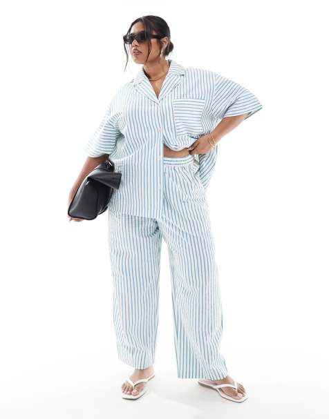 ASOS DESIGN Curve seersucker pull on barrel leg trousers co-ord in blue stripe - view 1