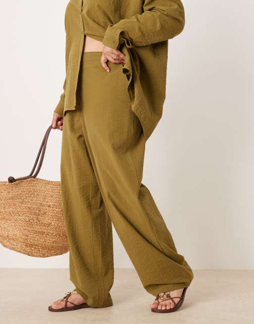 ASOS DESIGN Curve seersucker relaxed pull on pants in olive - part of a set
